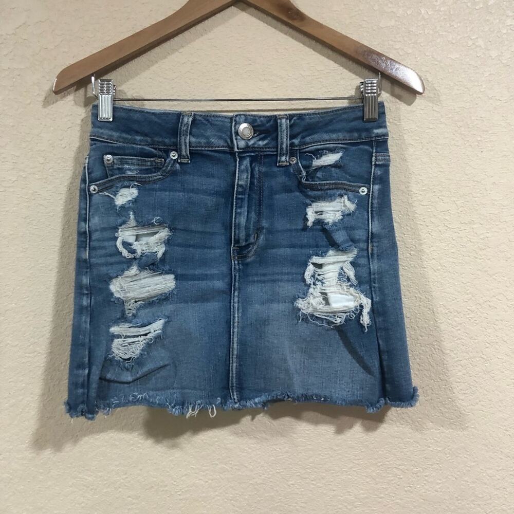 American Eagle Outfitters AEO distressed medium blue wash high rise mini skirt